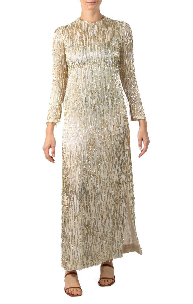 1960S White Silk Chiffon Empire Waist Gown Covered In Gold & Silver Beaded Fringe 1960S White Silk Chiffon Empire Waist Gown Covered In Gold & Silver Beaded Fringe