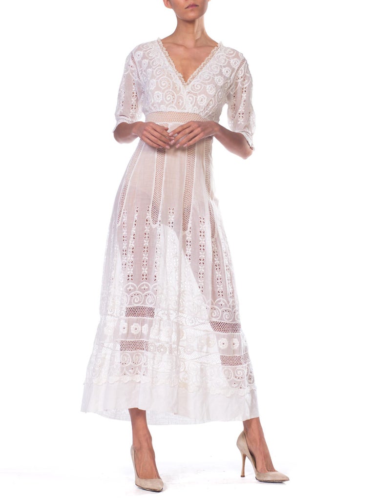 Edwardian Cream Embroidered Cotton Voile & Lace Tea Dress With Empire Waistline And Half Sleeves Edwardian Cream Embroidered Cotton Voile & Lace Tea Dress With Empire Waistline And Half Sleeves