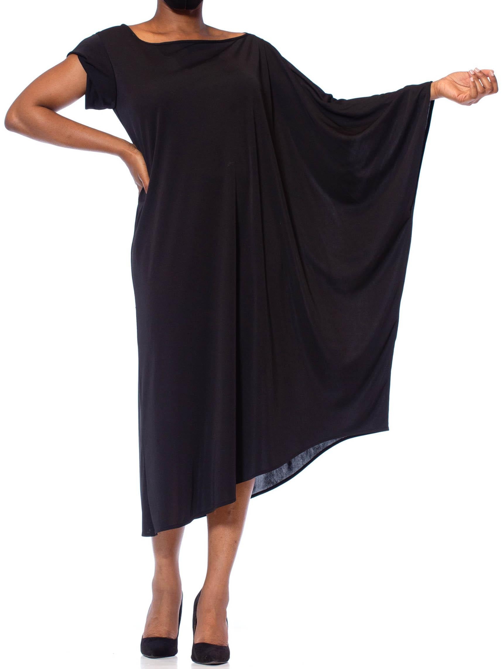 Black Poly Blend Jersey One Sleeve Kaftan Dress Black Poly Blend Jersey One Sleeve Kaftan Dress